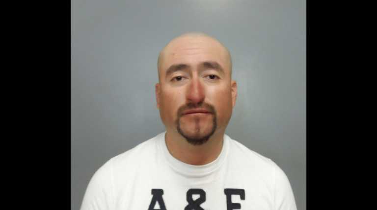 Man arrested after injuring 1 with machete-like weapon