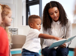 Only 1 in 6 homeless infants and toddlers enrolled in early childhood programs in California, study finds Child reading