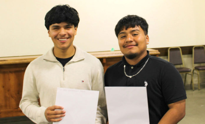 KCHS-seniors-Andres-Bedolla-and-Alex-Santiago-after-receiving-their-scholarship