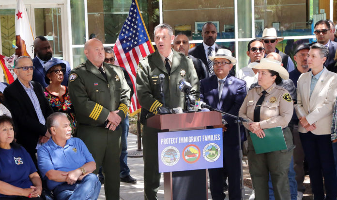 Tri-county-immigrant-presser-photo immigration
