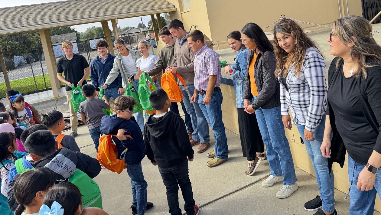 Taylor Farms distributes thousands of backpacks to local students