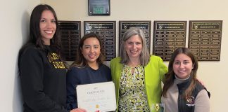 Hartnell College Foundation team with award