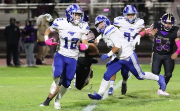 Football | King City Mustangsā Tidwell breaks rushing records King City Mustang running back Carson Tidwell