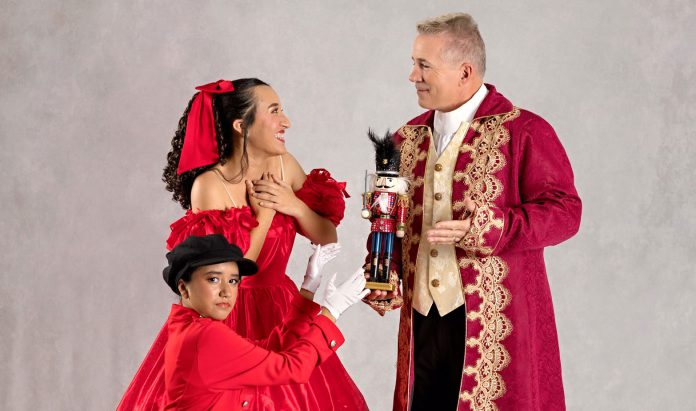 Herr-Drosselmeyer-gives-Clara-the-Nutcracker-as-Fritz-waits- Nutcracker Ballet cast