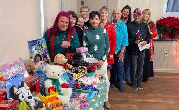 Photo | Republican women donate toys to Loaves and Fishes Women with collected toys