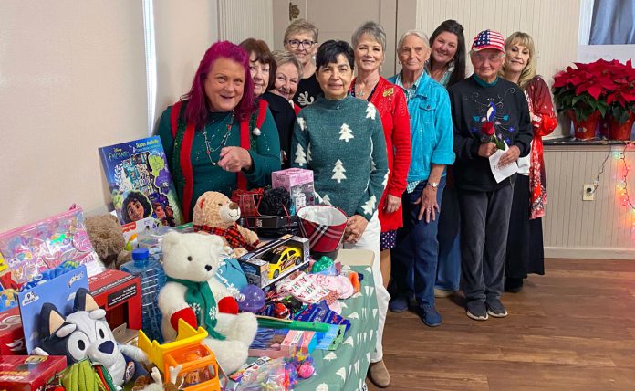 KC-Repub-Women-toys-photo Women with collected toys