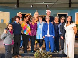 Cast members on stage