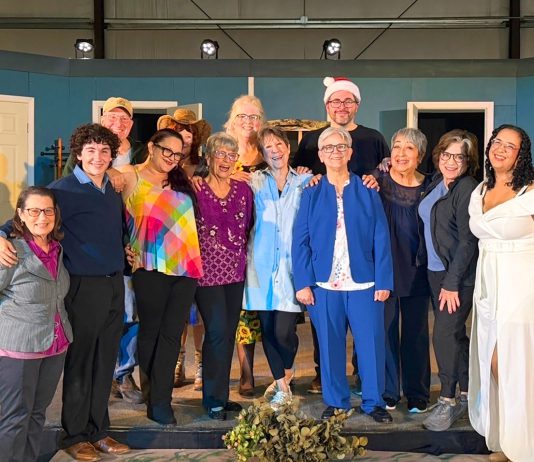 Cast members on stage