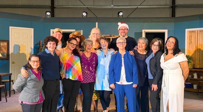 Cast members on stage