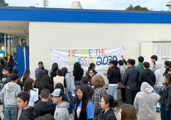 Students sign poster