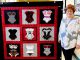 Quilt helps bring new mammography technology to Mee Memorial Hospital Woman stands by quilt