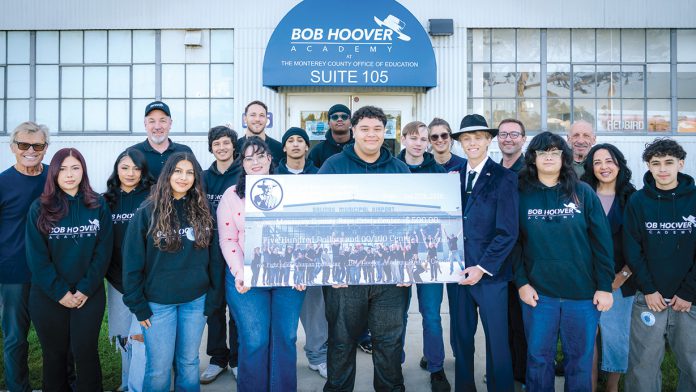 BHA students with check Bob Hoover Academy students with check