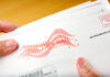 Voter receiving ballot in mail