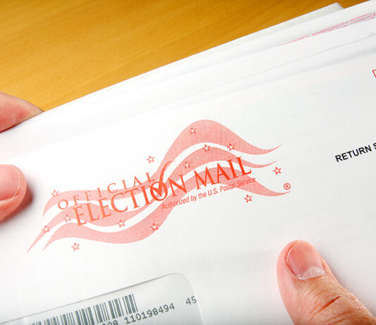 Voter receiving ballot in mail