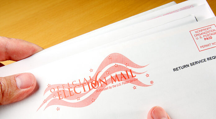 Voter receiving ballot in mail