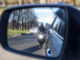 motorcycle and vehicle, view in a side mirror