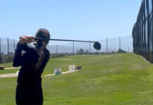 Girl playing golf