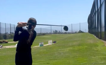 Girl playing golf