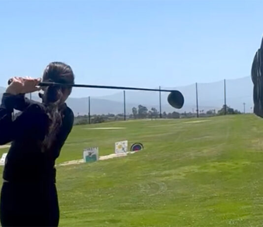 Girl playing golf