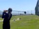Girl playing golf