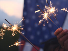 Cal Fire, local partners unite to promote fireworks safety Hand holding sparkler fireworks