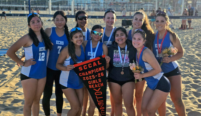 KCHS beach volleyball 1 team with banner KCHS beach volleyball
