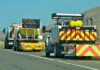 Brush clearing set for Highway 101 near San Ardo Caltrans trucks mounted with Crash Cushions and flashing arrow lights protect highway-side workers