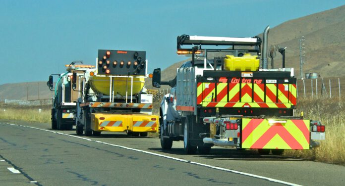 Caltrans trucks mounted with Crash Cushions and flashing arrow lights protect highway-side workers Caltrans trucks mounted with Crash Cushions and flashing arrow lights protect highway-side workers