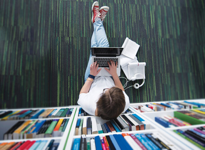 Student in library