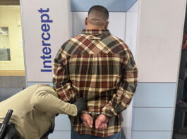 Convicted felon arrested after loaded handgun found during King City traffic stop Man under arrest by deputy