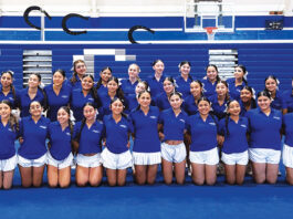 KCHS cheer team with USA staff