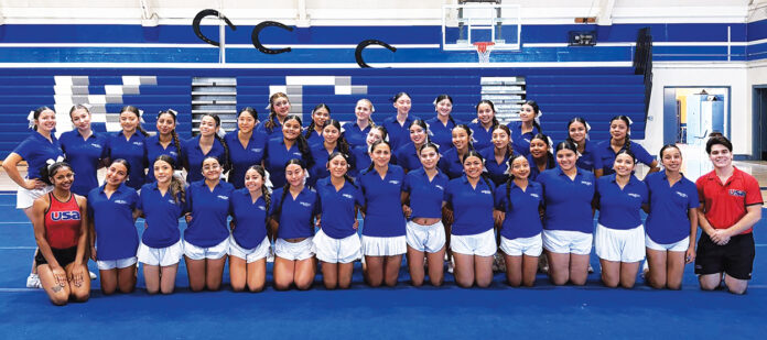 KCHS cheer team with USA staff