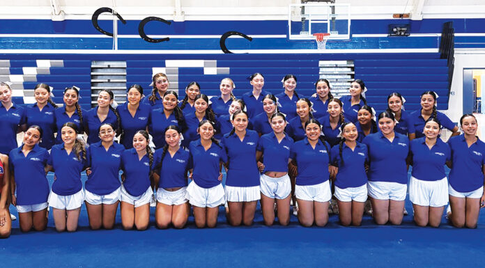 King City High cheer athletes earn ticket to London KCHS cheer team with USA staff