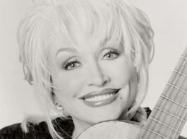Dolly Parton with guitar