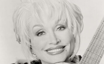 Dolly Parton with guitar