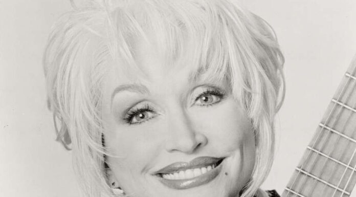 Dolly Parton with guitar